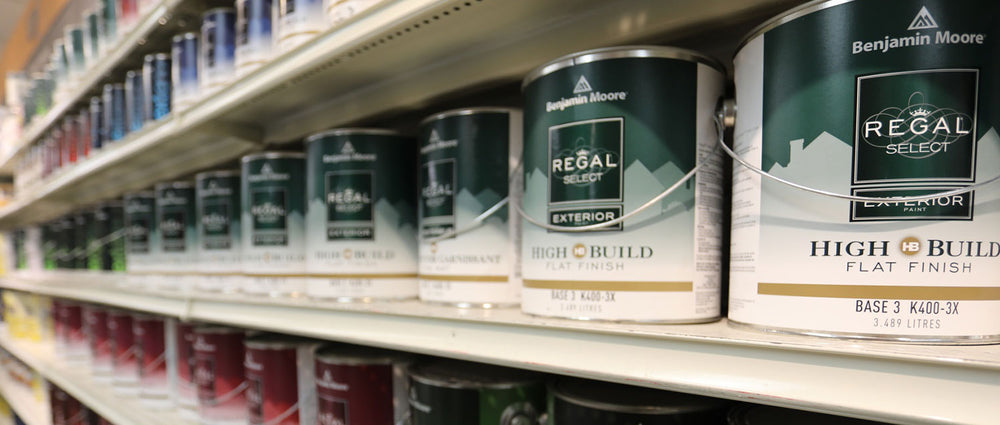 store shelves filled with regal select paint cans